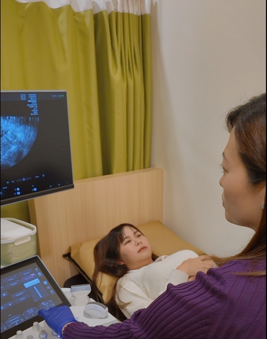 Doctor speaking warmly with a patient